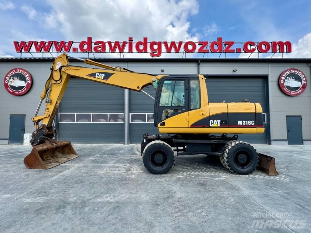 CAT M 316 C حفارات بعجل