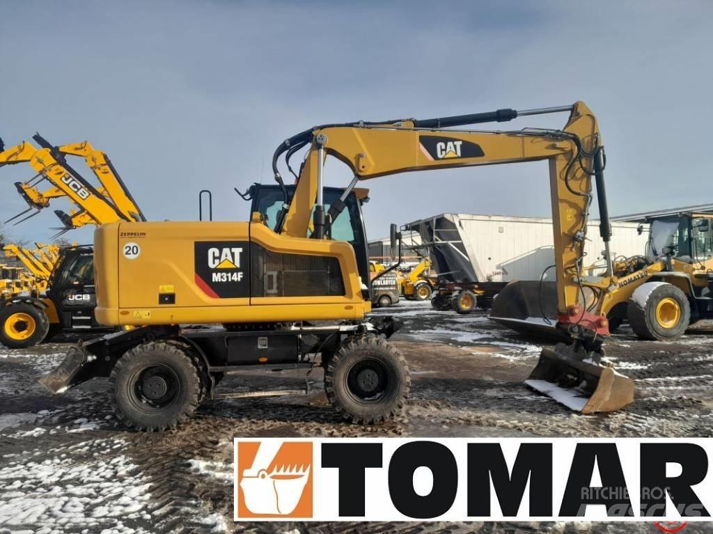 CAT M 314 F حفارات بعجل