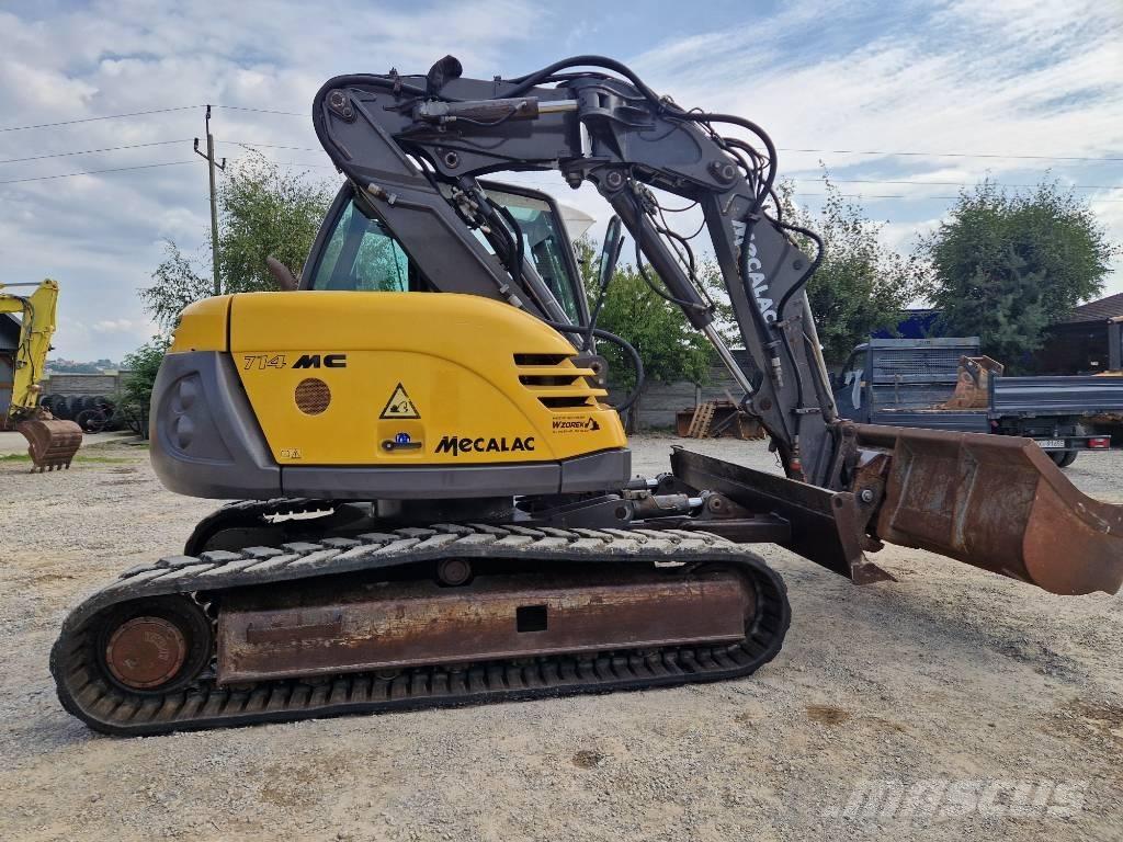 Mecalac 714 MC حفارات زحافة
