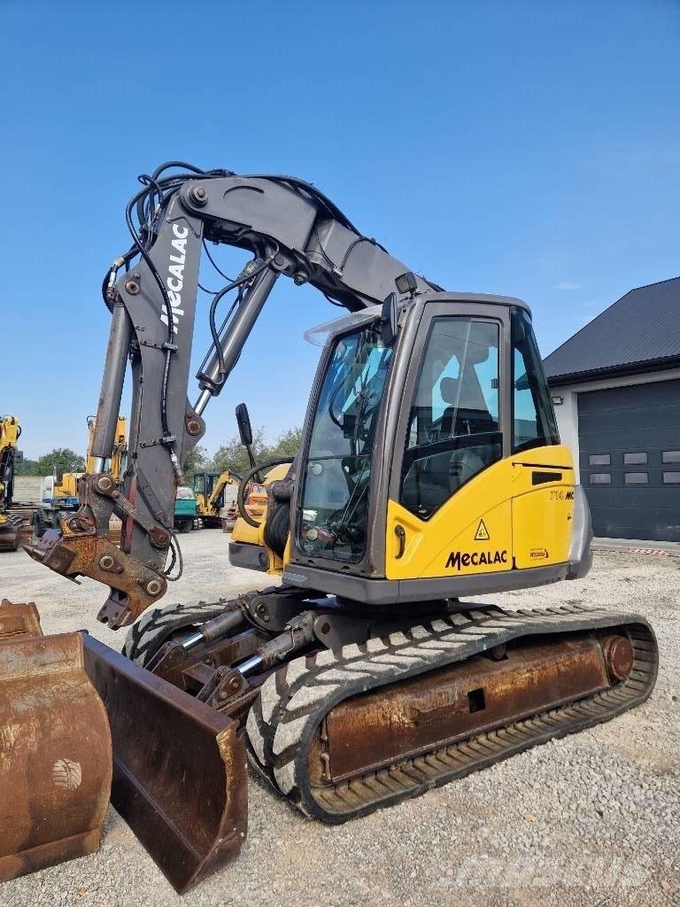 Mecalac 714 MC حفارات زحافة