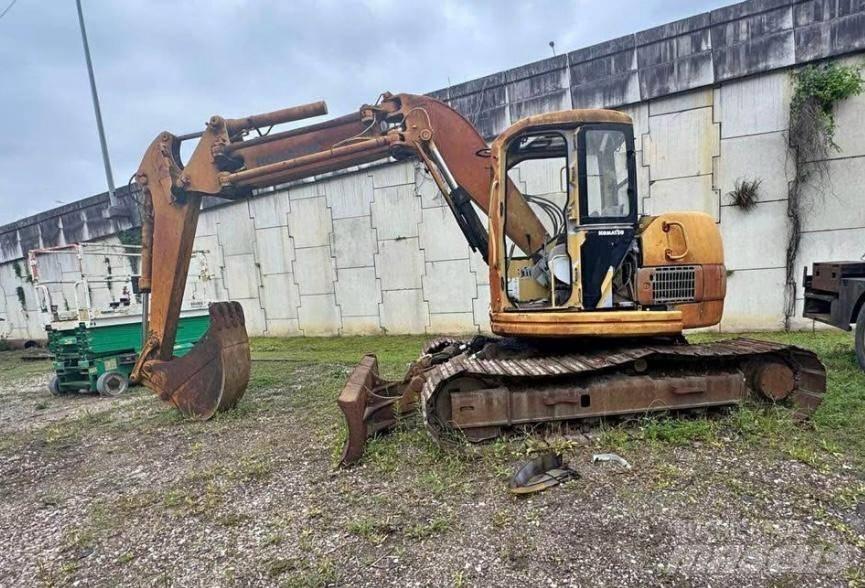 Komatsu PC 128 UU-1E حفارات زحافة