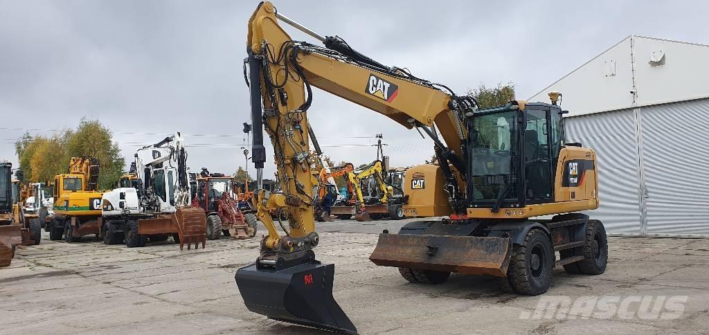 CAT M314 F حفارات بعجل