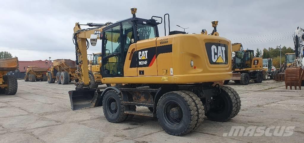 CAT M314 F حفارات بعجل