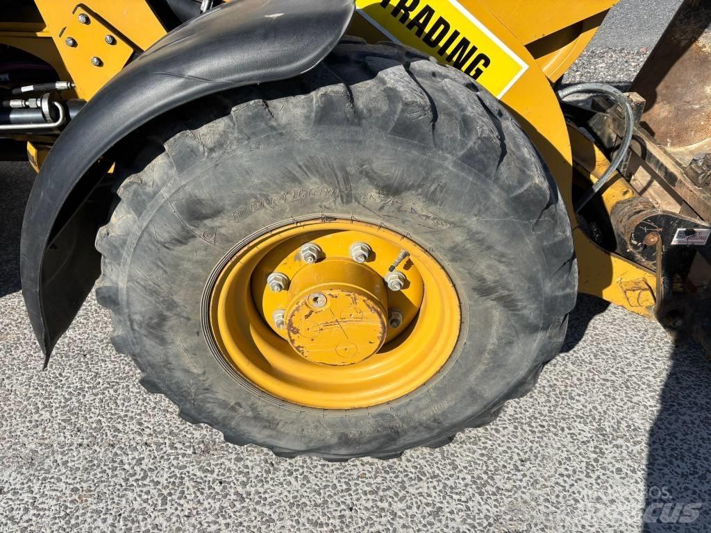 CAT 906 M لوادر بعجل