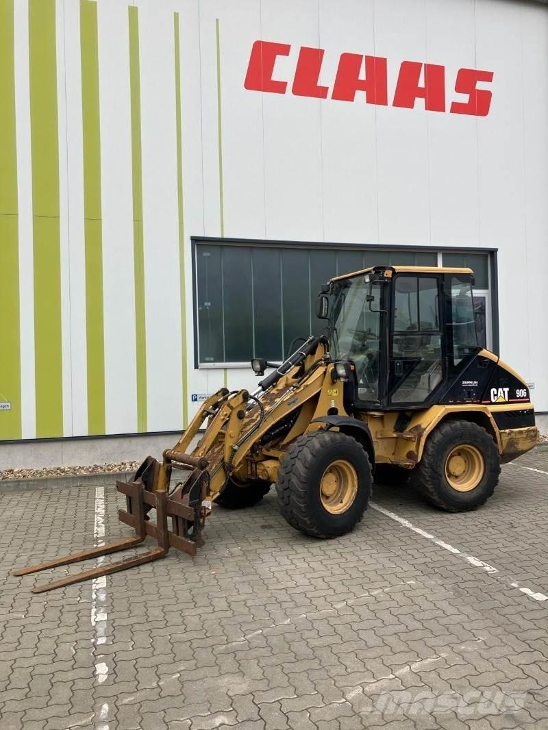 CAT 906 لوادر بعجل