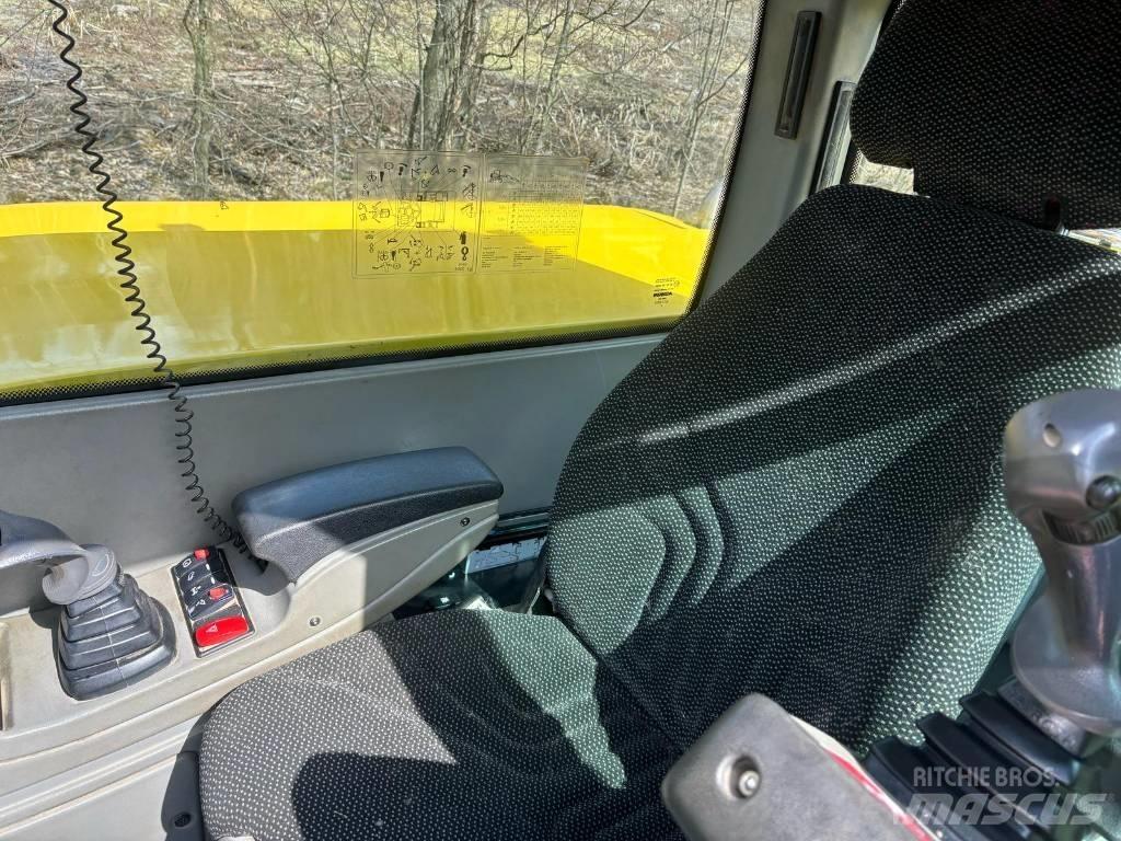 Yanmar B 110 W حفارات بعجل
