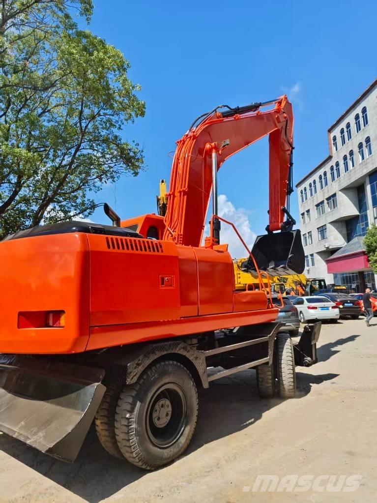 Doosan DH 210 W-7 حفارات بعجل