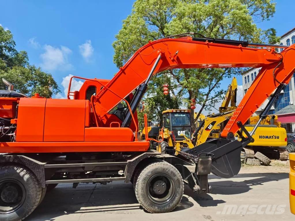 Doosan DH 210 W-7 حفارات بعجل