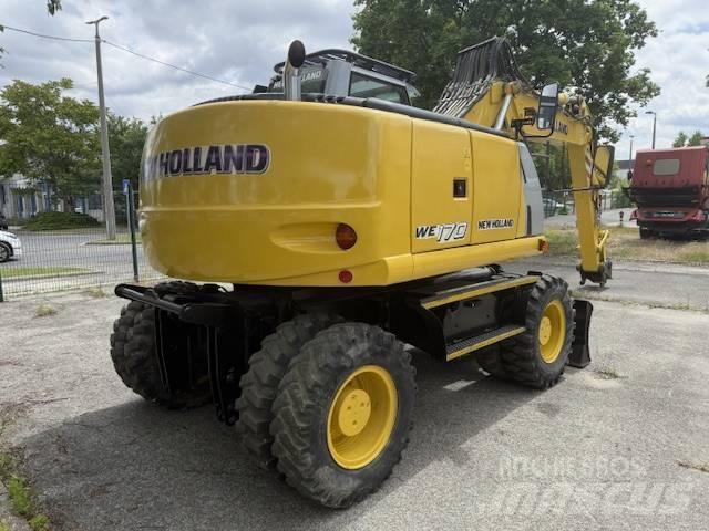 New Holland WE 170 C حفارات بعجل