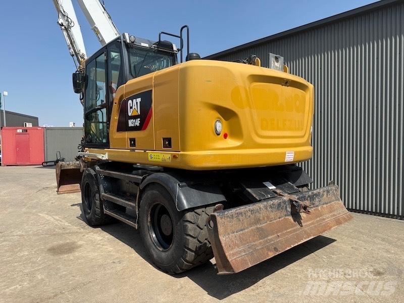 CAT M314F حفارات بعجل