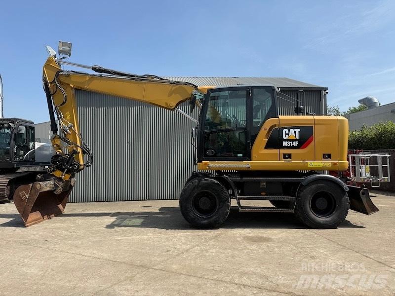 CAT M314F حفارات بعجل