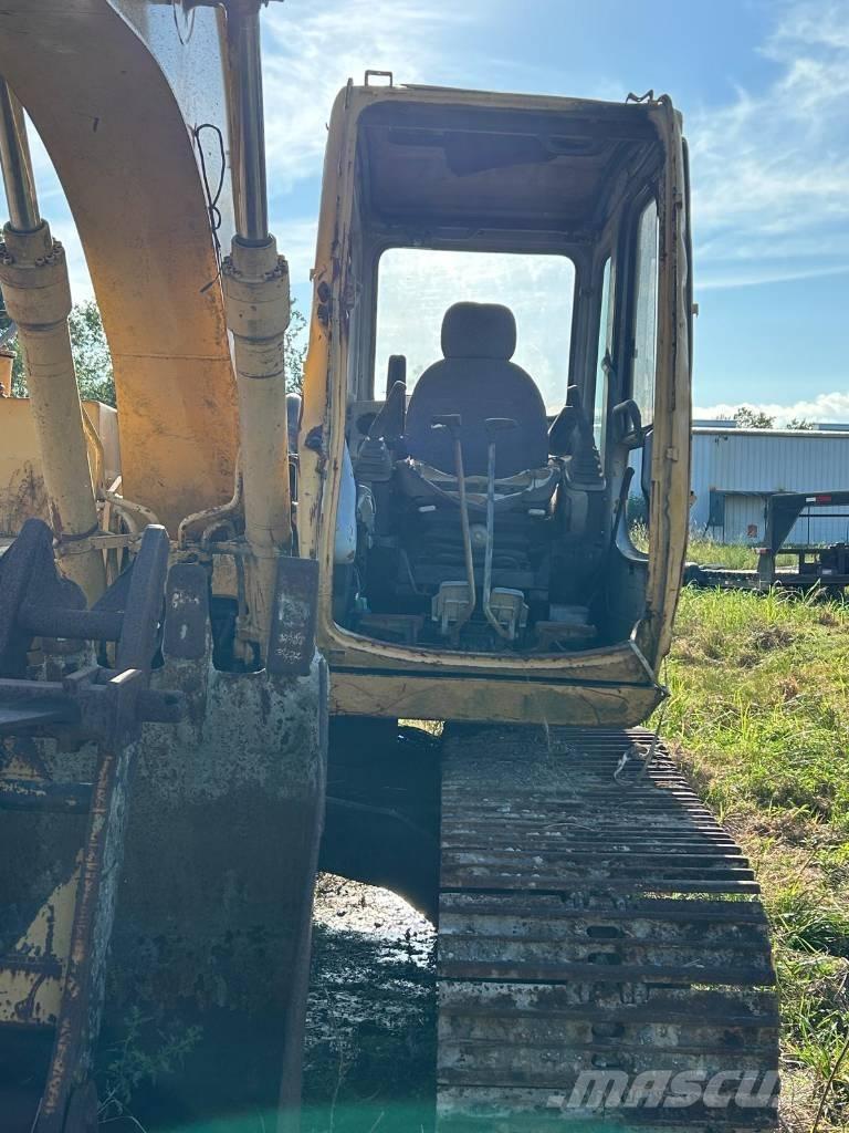 John Deere 120 حفارات زحافة