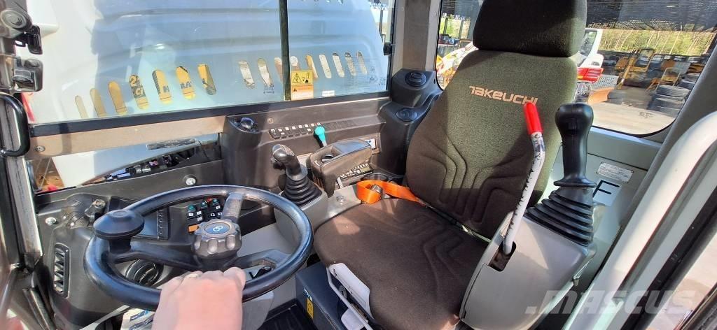 Takeuchi TB 295 W حفارات بعجل