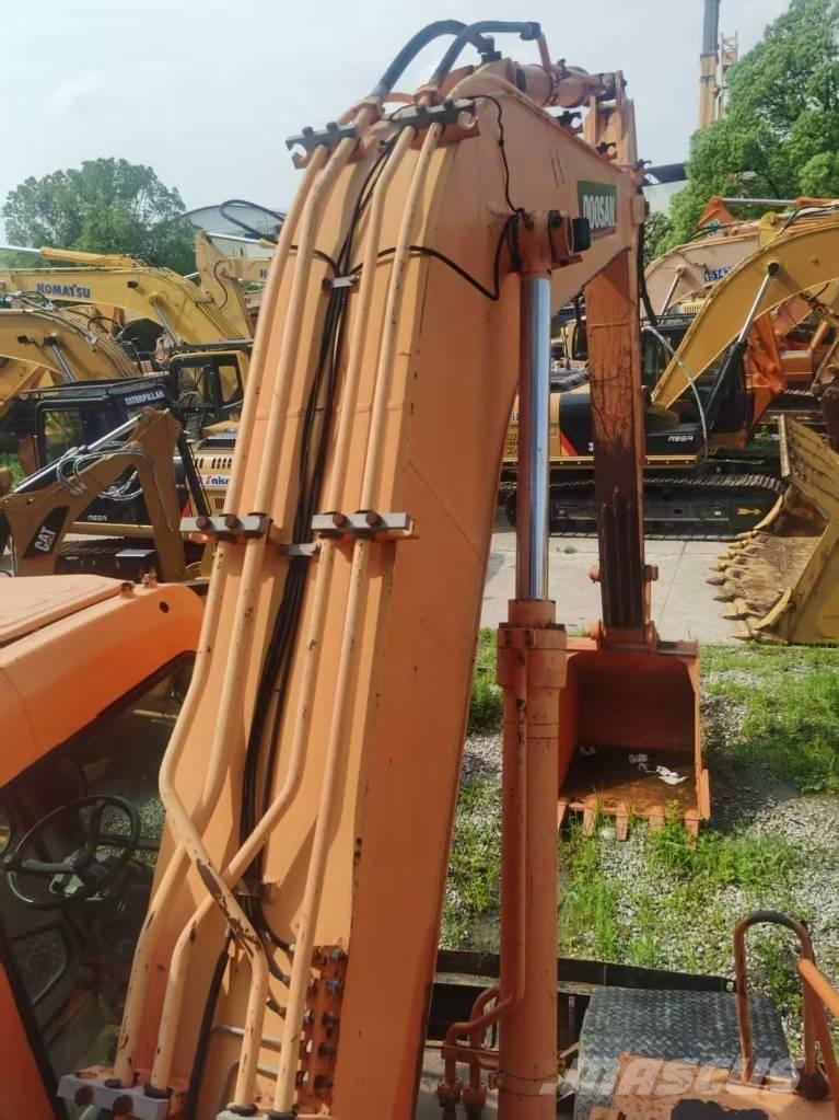 Doosan DH 210 W-7 حفارات بعجل