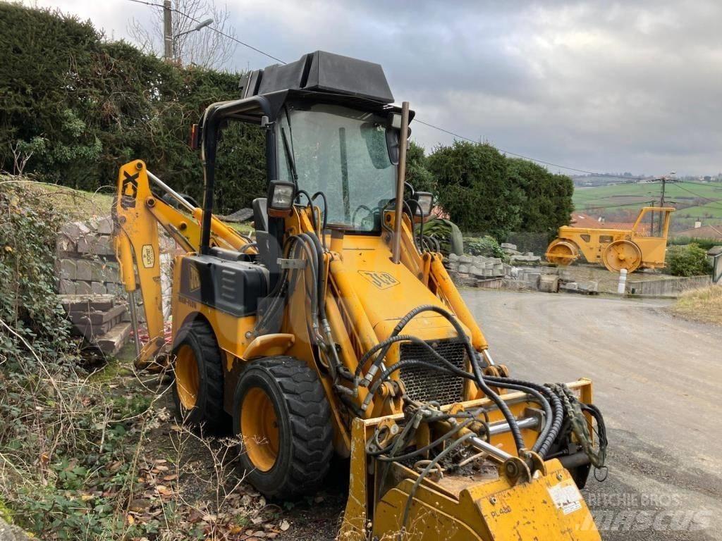 JCB 1 CX لوادر ذات جرافات عكسية