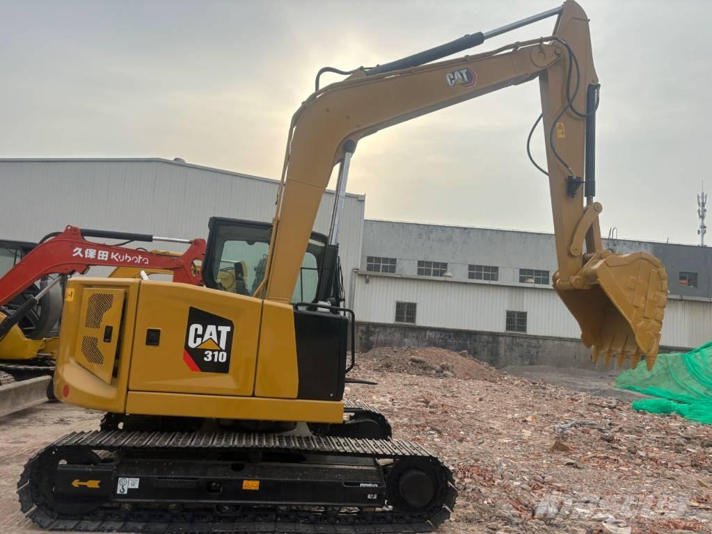 CAT 310 حفارات زحافة