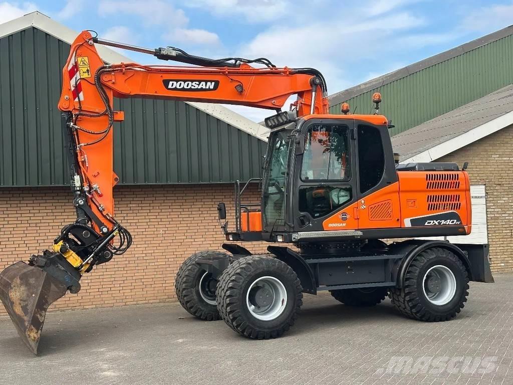 Doosan DX140W-5 حفارات بعجل