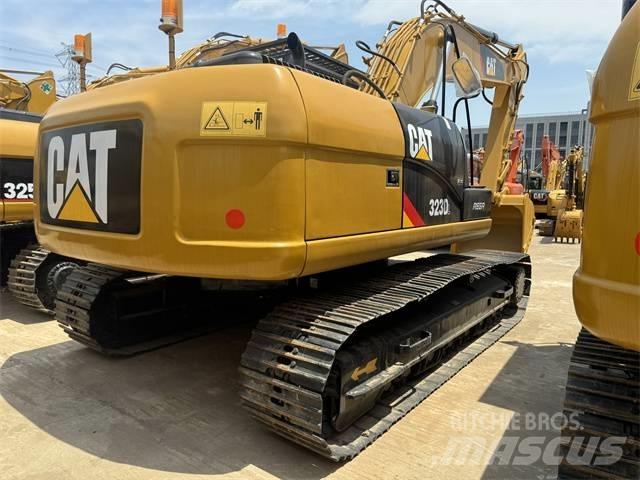 CAT 323 D L حفارات زحافة