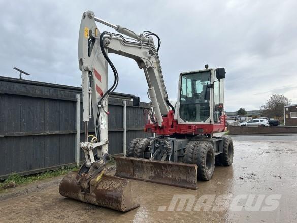 Takeuchi TB295W حفارات زحافة