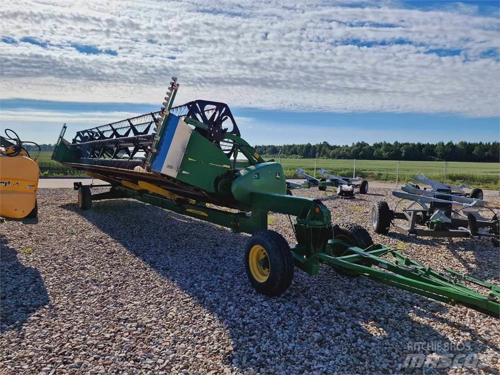 John Deere S680 الجرارات