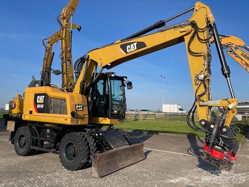 CAT M 315 F حفارات بعجل