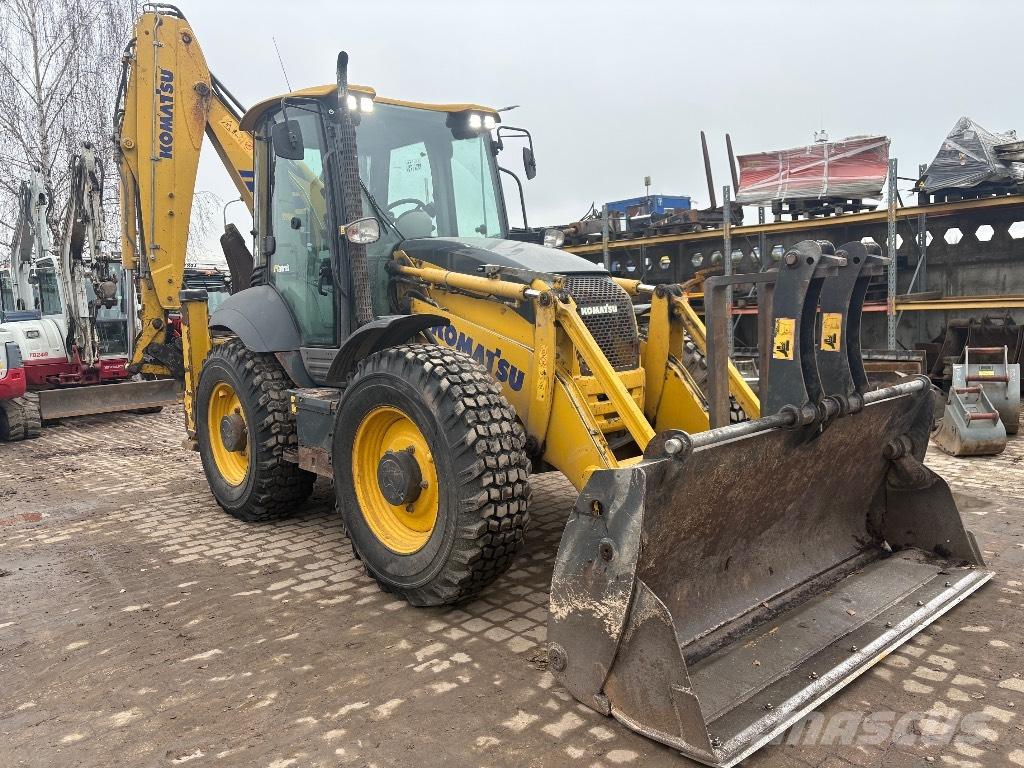 Komatsu WB 97 S لوادر ذات جرافات عكسية