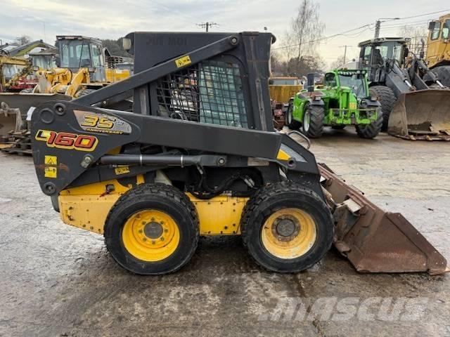 New Holland L 160 لوادر انزلاقية التوجيه