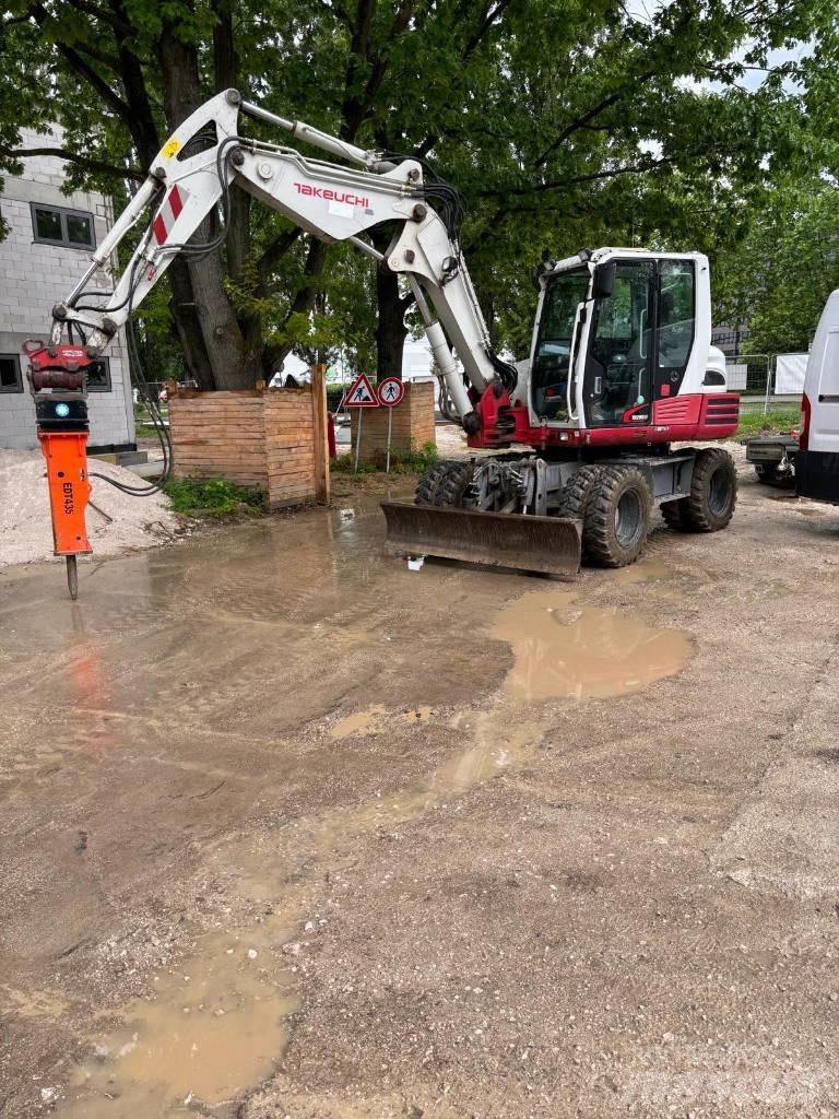 Takeuchi TB295W حفارات بعجل