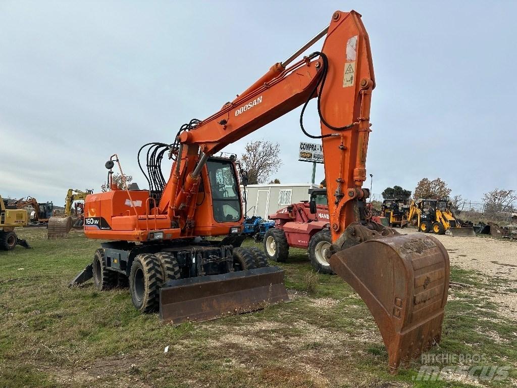 Doosan Solar 160 W V حفارات بعجل