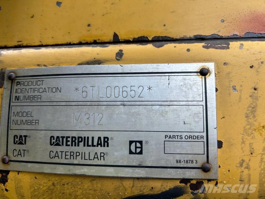 CAT M 312 حفارات بعجل