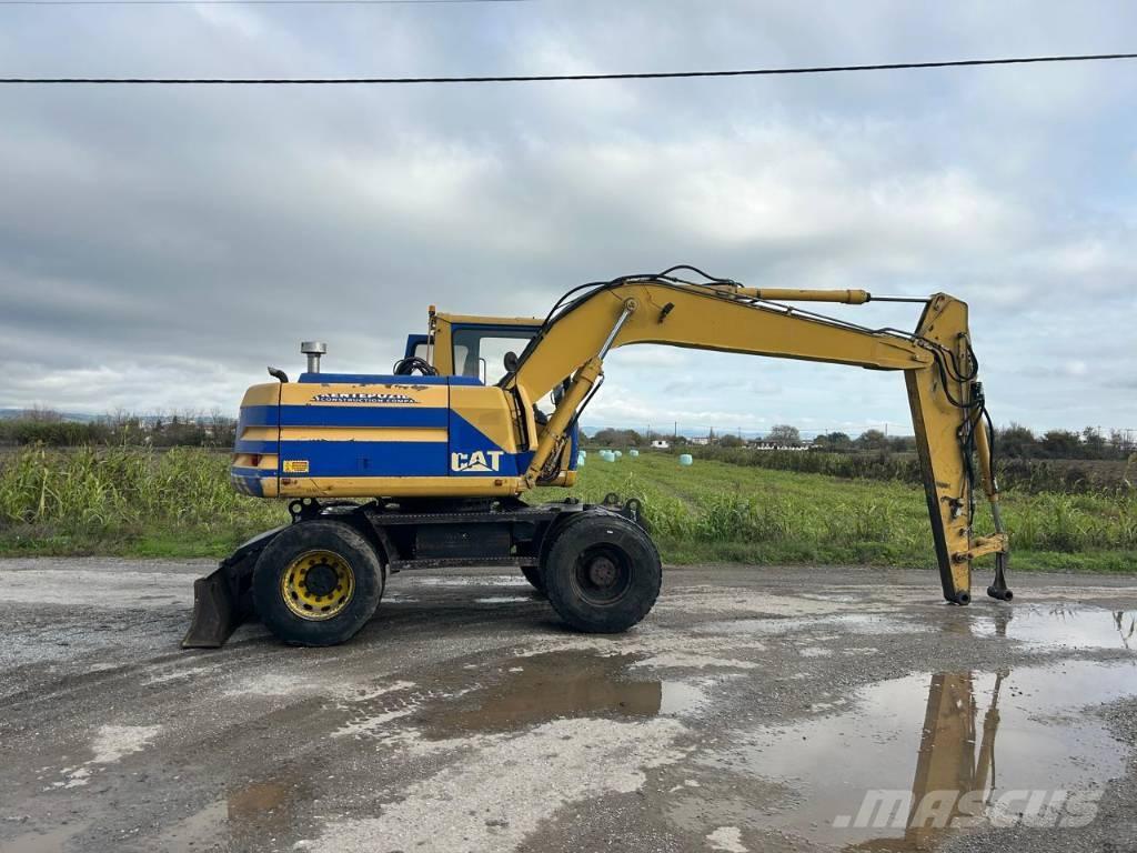 CAT M 312 حفارات بعجل