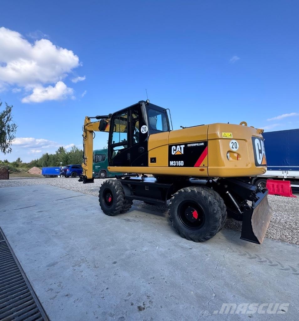 Catepillar 316 D حفارات بعجل