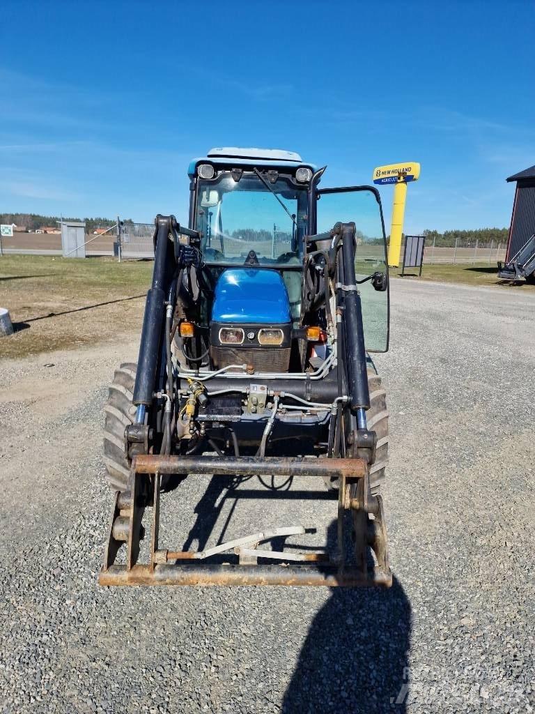 New Holland TN65F الجرارات