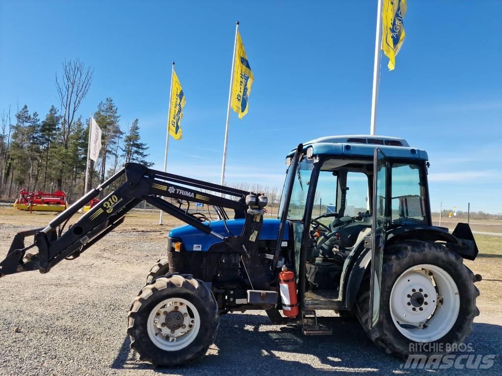 New Holland TN65F الجرارات