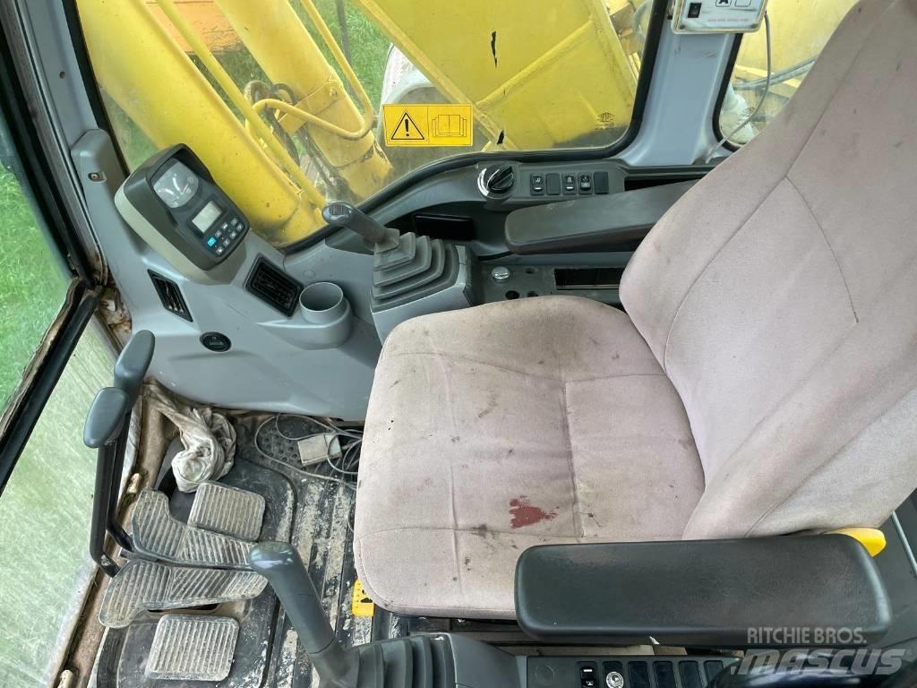 New Holland E 215 حفارات زحافة