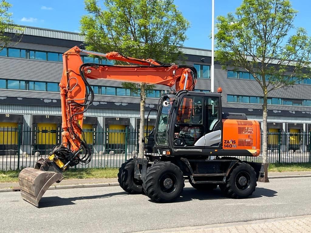 Hitachi ZX 140 W-5 حفارات بعجل