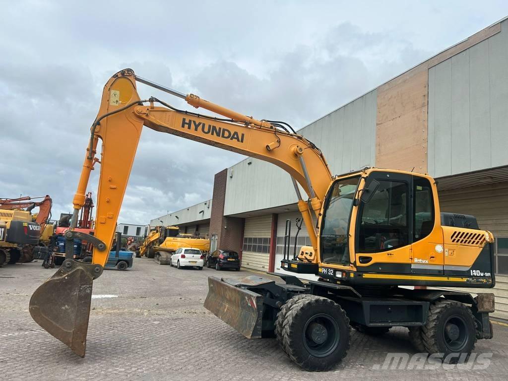 Hyundai 140W-9A حفارات بعجل