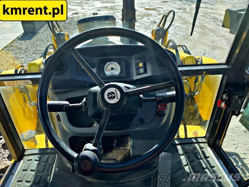 New Holland LB 115 لوادر ذات جرافات عكسية