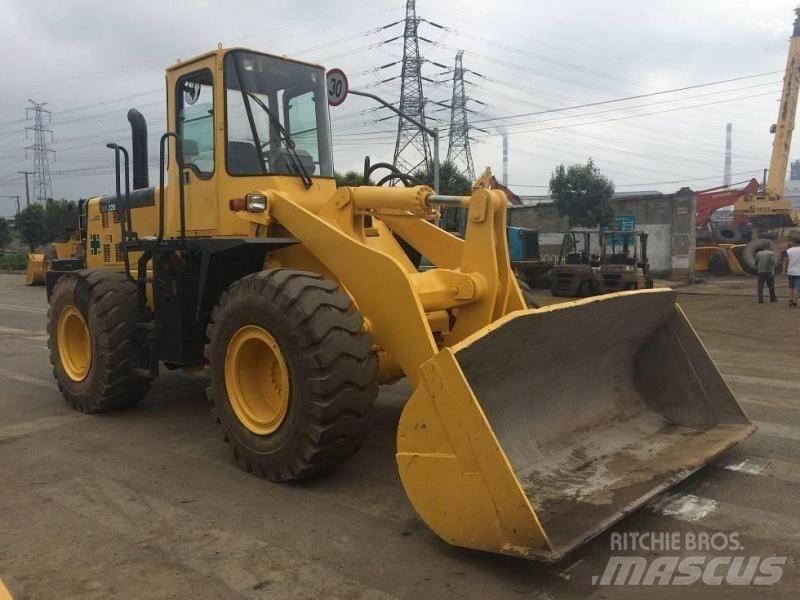 Komatsu WA 320 لوادر ذات جرافات عكسية