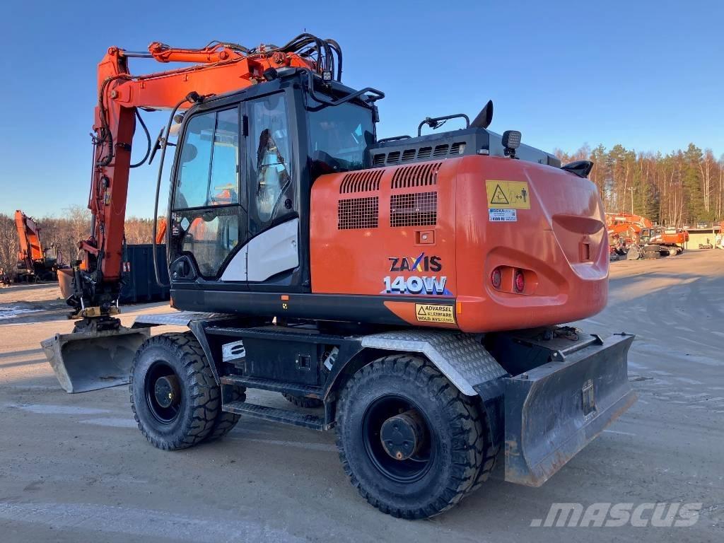 Hitachi ZX 140 WT-6 حفارات بعجل