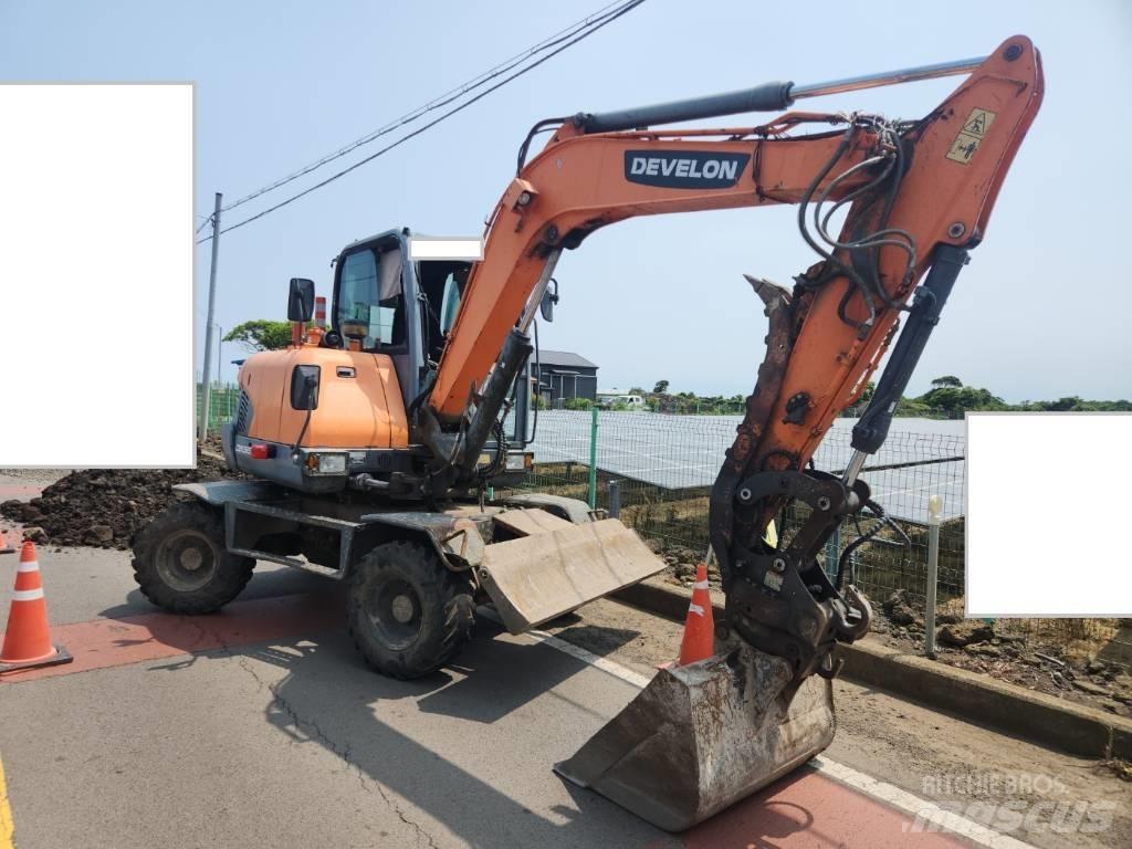 Doosan DX 55 W حفارات بعجل