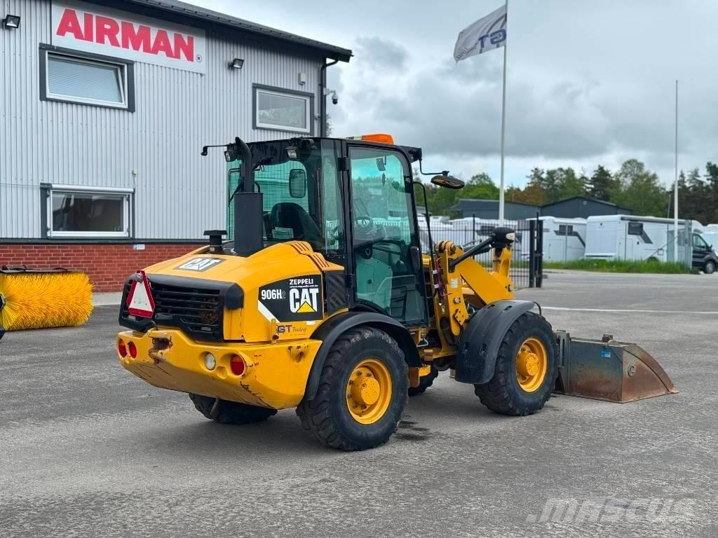 CAT 906 H لوادر بعجل