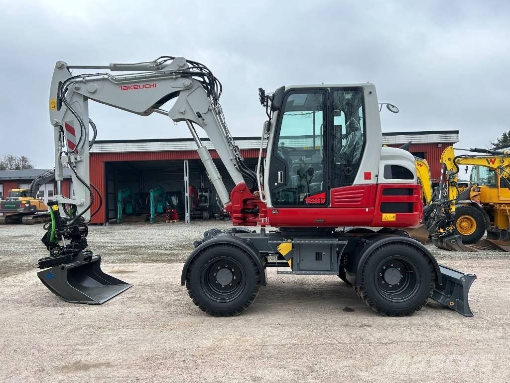 Takeuchi TB395W حفارات بعجل