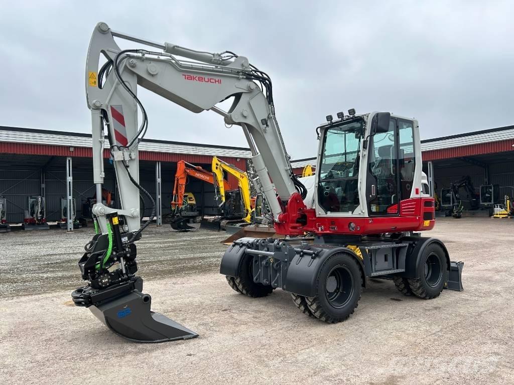 Takeuchi TB395W حفارات بعجل