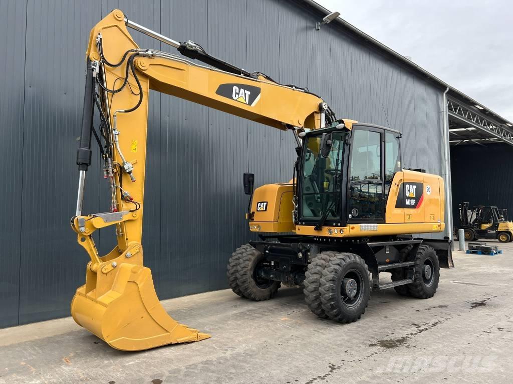 CAT M318F حفارات بعجل