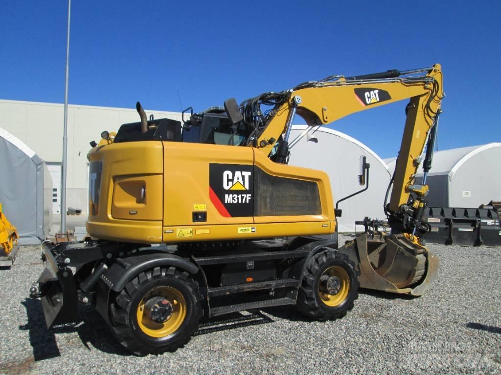 CAT M 317F حفارات بعجل