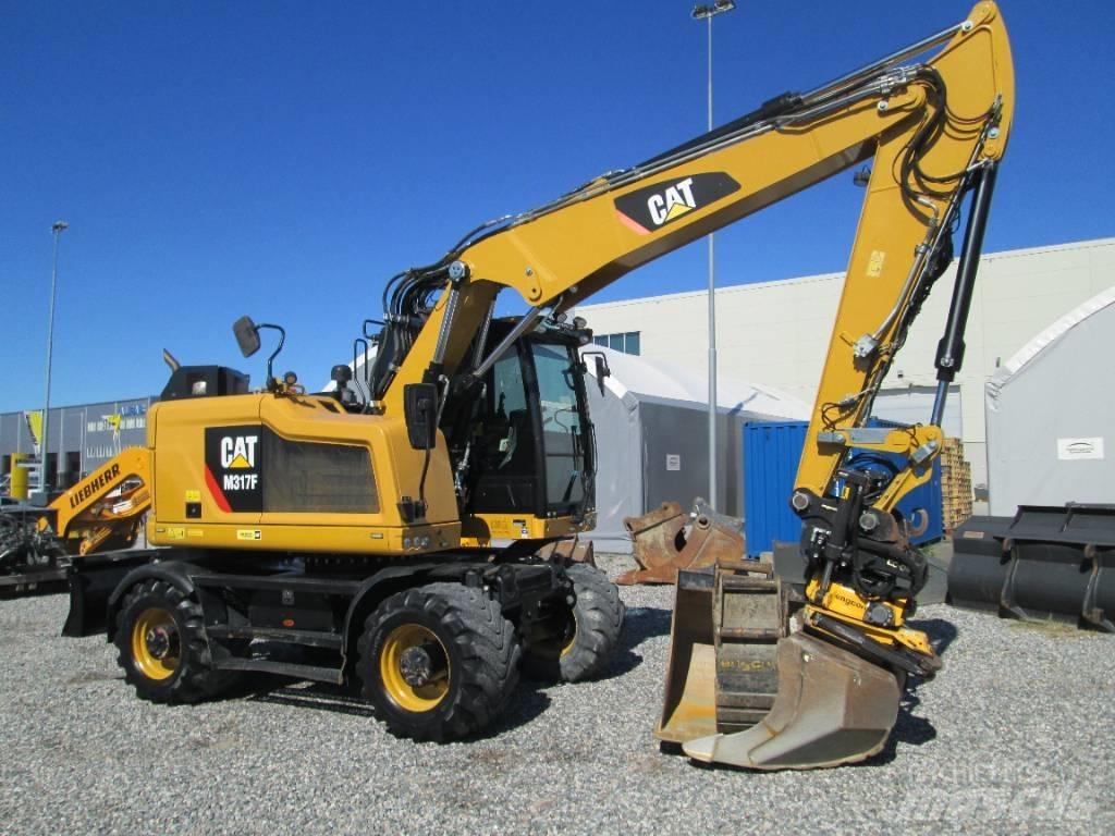 CAT M 317F حفارات بعجل