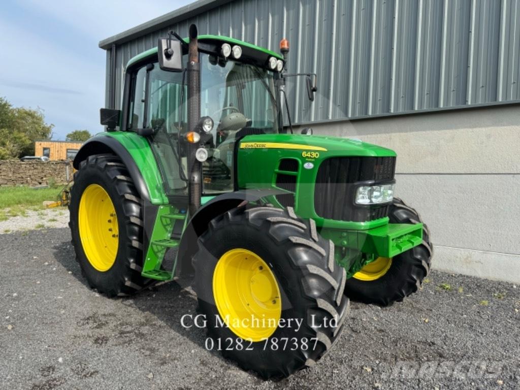 John Deere 6430 الجرارات