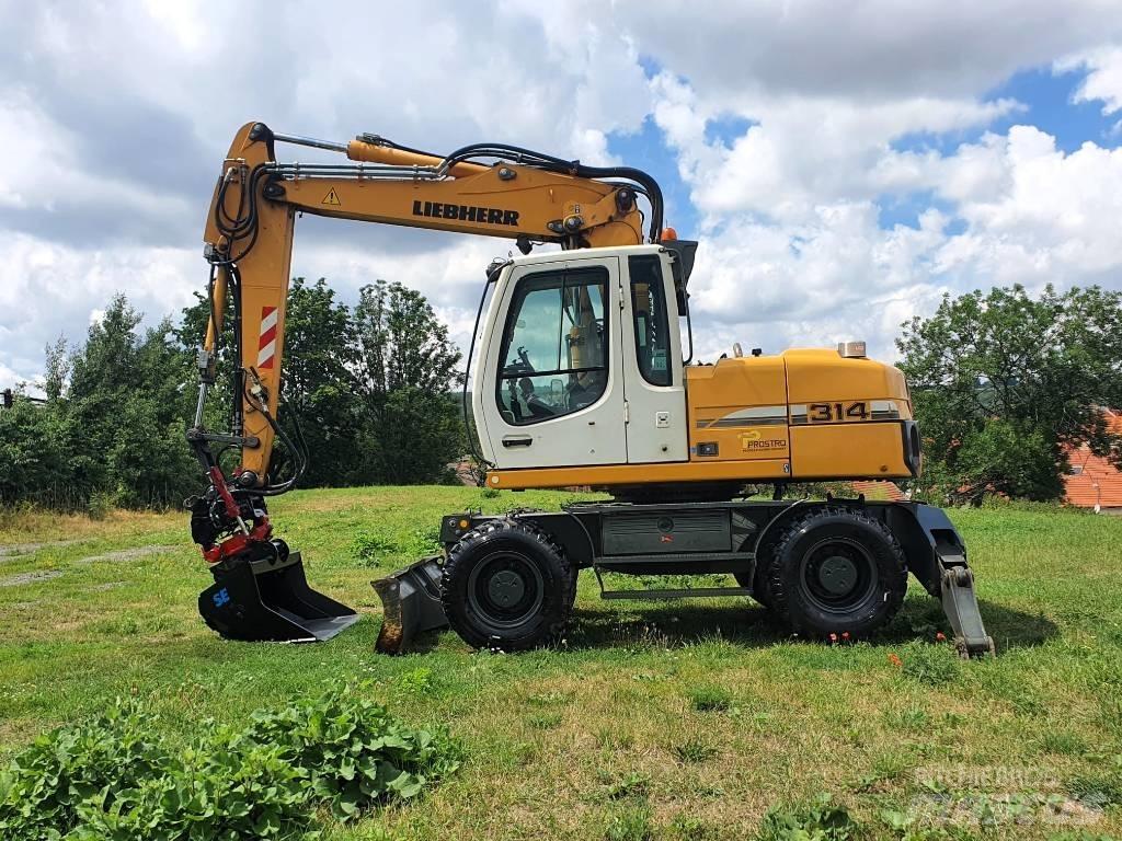 Liebherr A314 حفارات بعجل