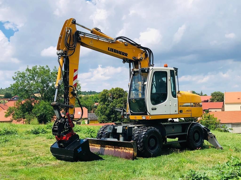 Liebherr A314 حفارات بعجل